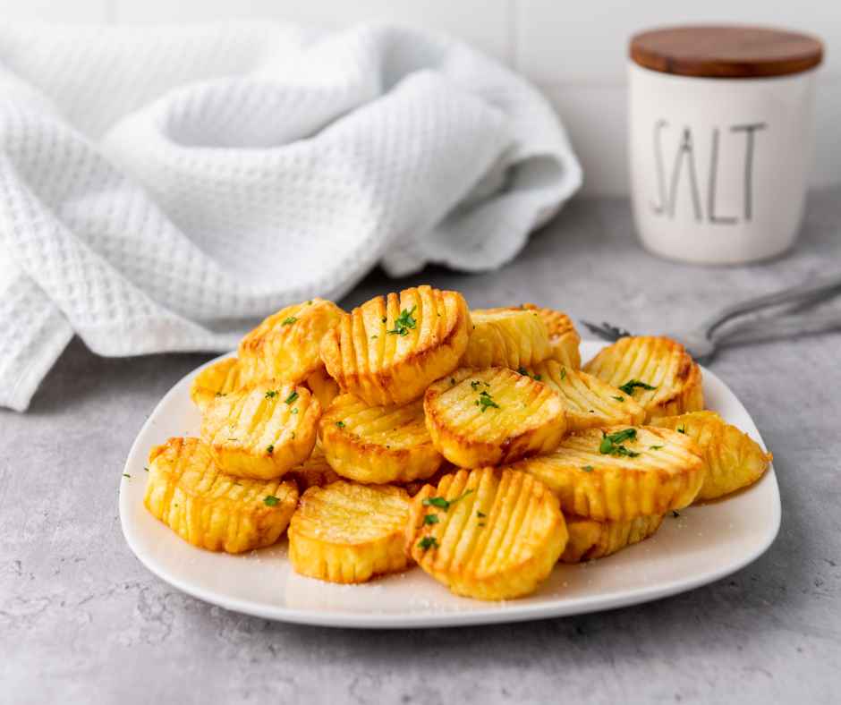 Crispy air fried potatoes on plate